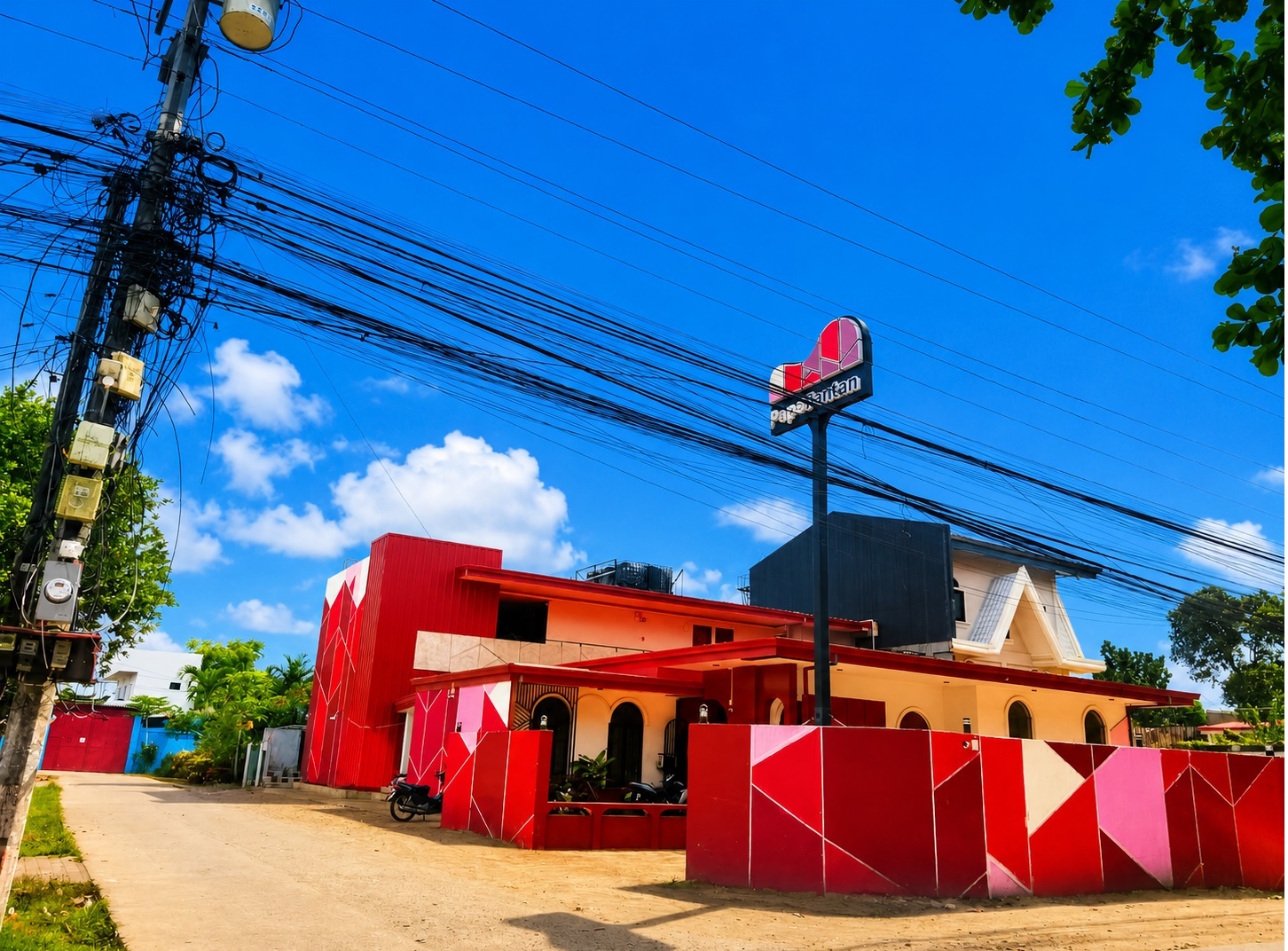 Papa Tantan Apartelle Daet branch building and signage